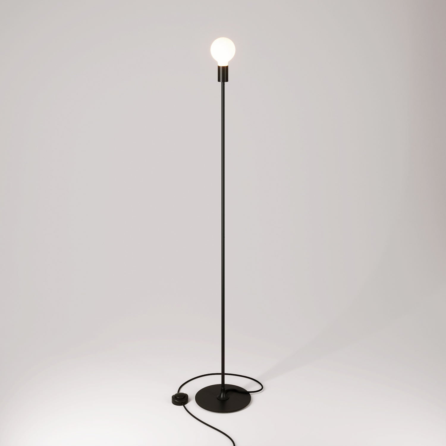 Lampada da terra MAG-Y con base metallica tonda e spina UK - Nero